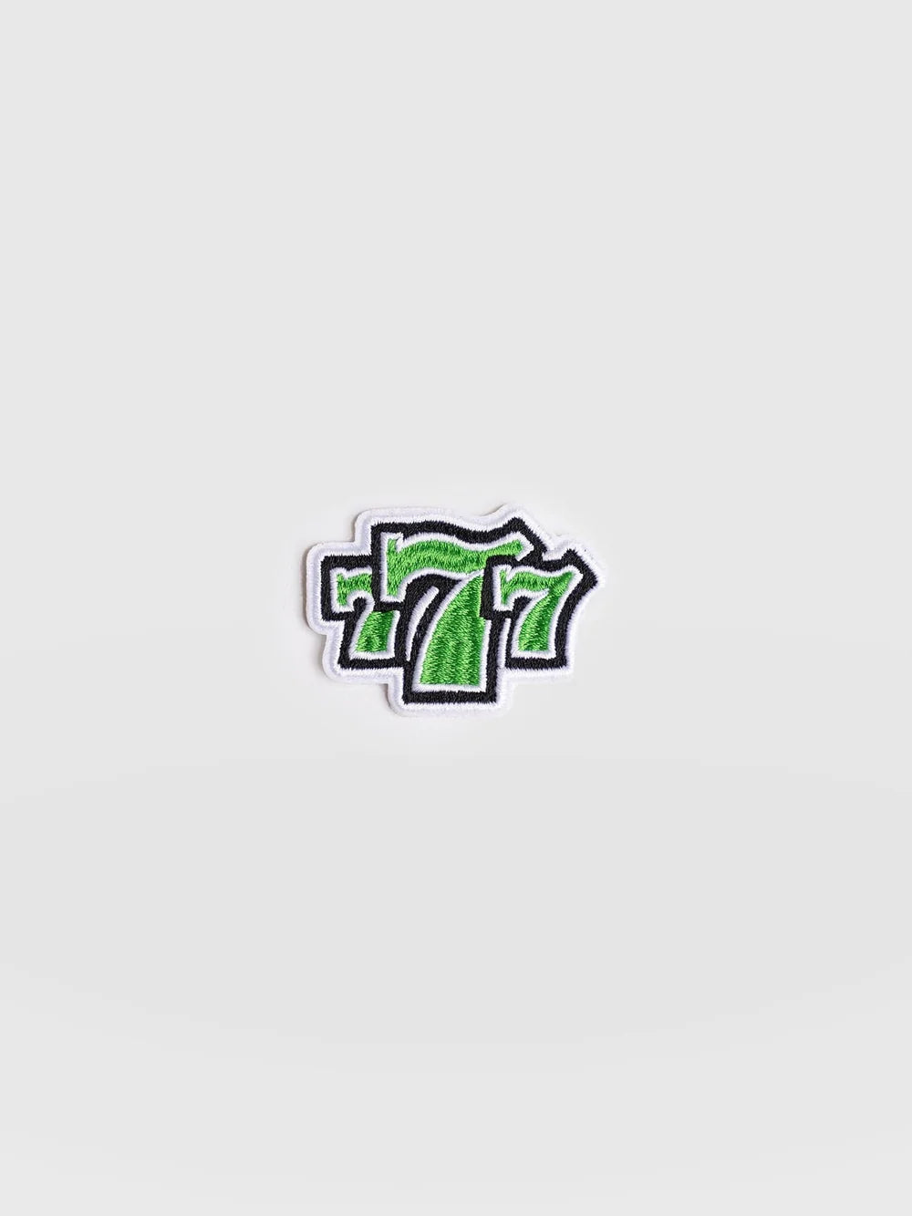 777 Sticker Badge