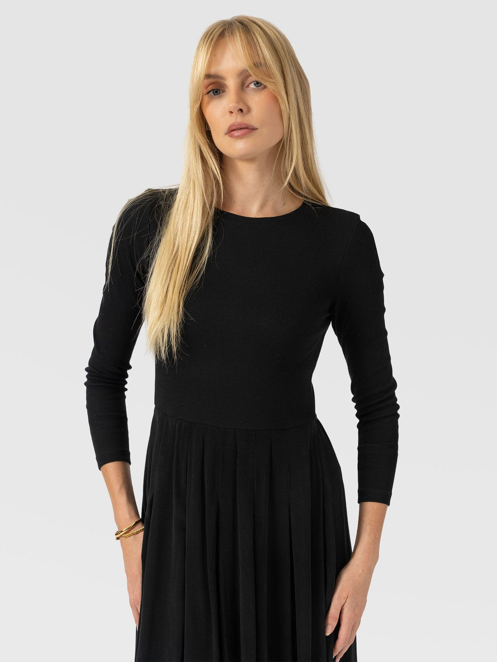 Renee Contrast Long Sleeve Dress A two-in-one effect dress with a softly pleated skirt