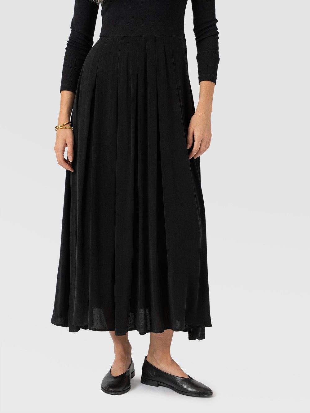 Renee Contrast Long Sleeve Dress A two-in-one effect dress with a softly pleated skirt